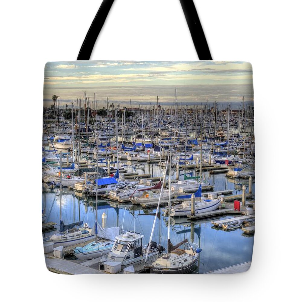Sunrise Tote Bag featuring the photograph Sunrise on the Harbor by Mathias 