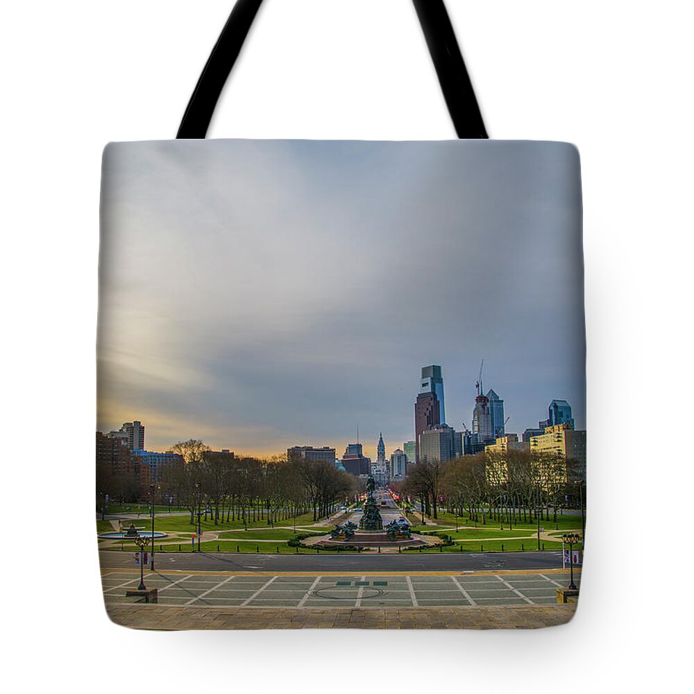 Sunrise Tote Bag featuring the photograph Sunrise on the Parkway - Philadelphia Pa by Bill Cannon