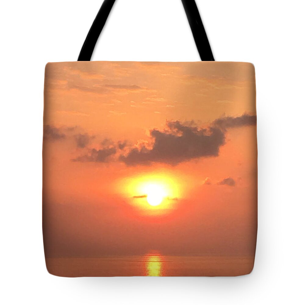 Sunsets Tote Bag featuring the photograph Sunset and Sailboat by Karen Nicholson