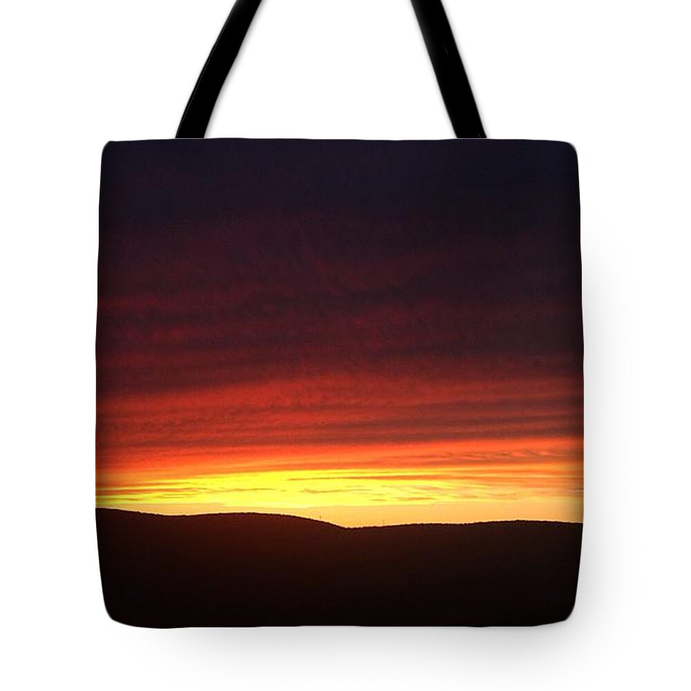 Sunset Tote Bag featuring the photograph Sunset by Annie Walczyk
