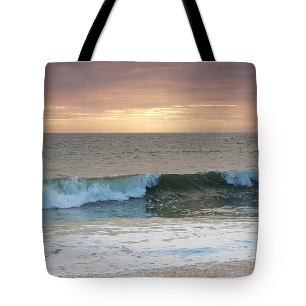 Beach Waves Tote Bag featuring the photograph Sunset Beach Waves by Angelo DeVal