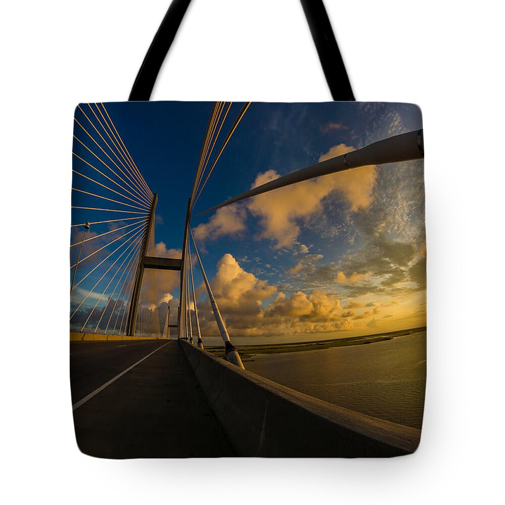 Brunswick Ga Tote Bag featuring the photograph Sunset Between Mighty Cables by Chris Bordeleau