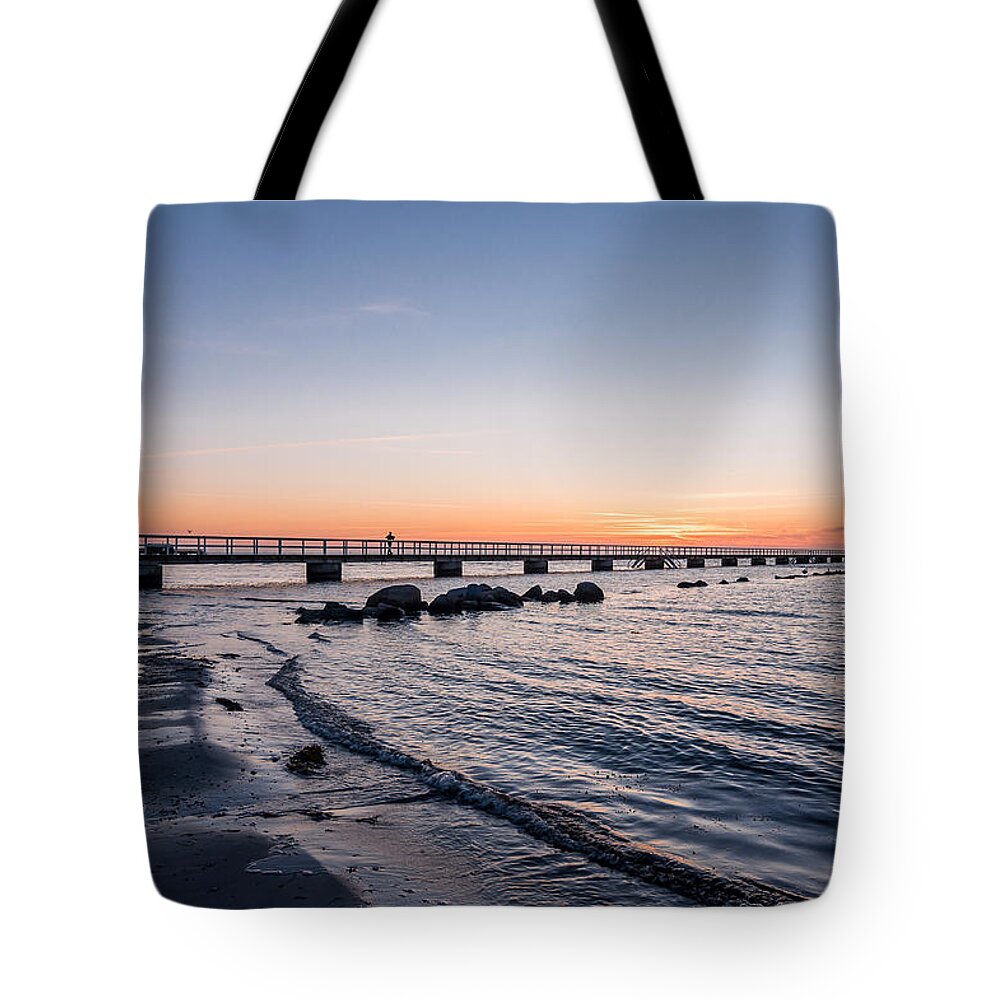 Beauty Tote Bag featuring the photograph Sunset Chaser by Marcus Karlsson Sall