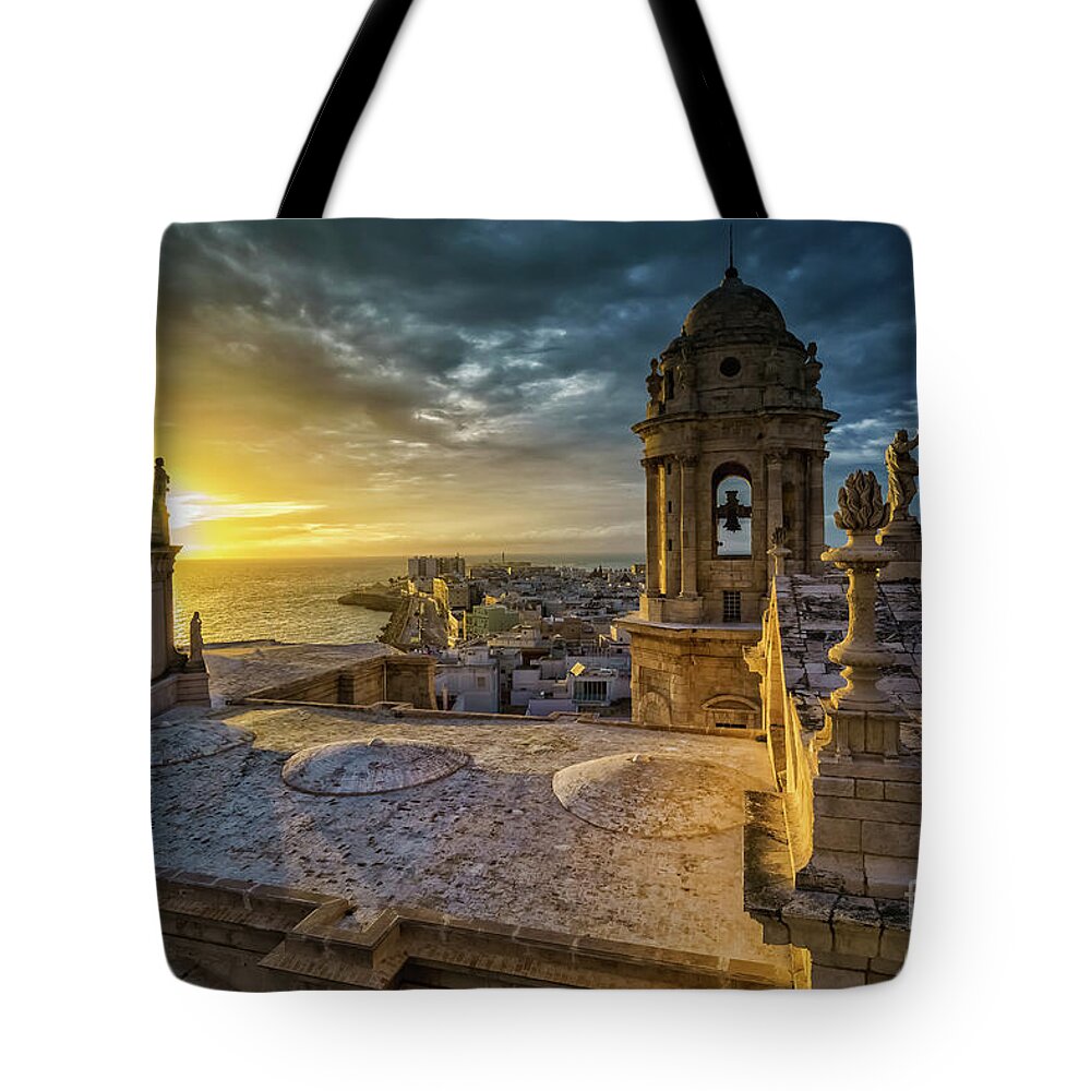 12mm F2 Tote Bag featuring the photograph Sunset in Cadiz Cathedral View from Levante Tower Cadiz Spain by Pablo Avanzini