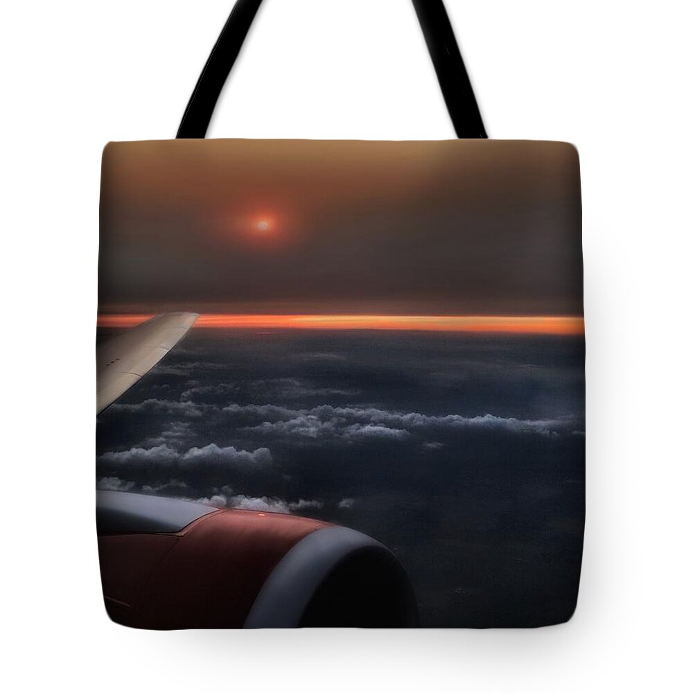 Sunset Tote Bag featuring the photograph Sunset in the clouds by Diana Rajala