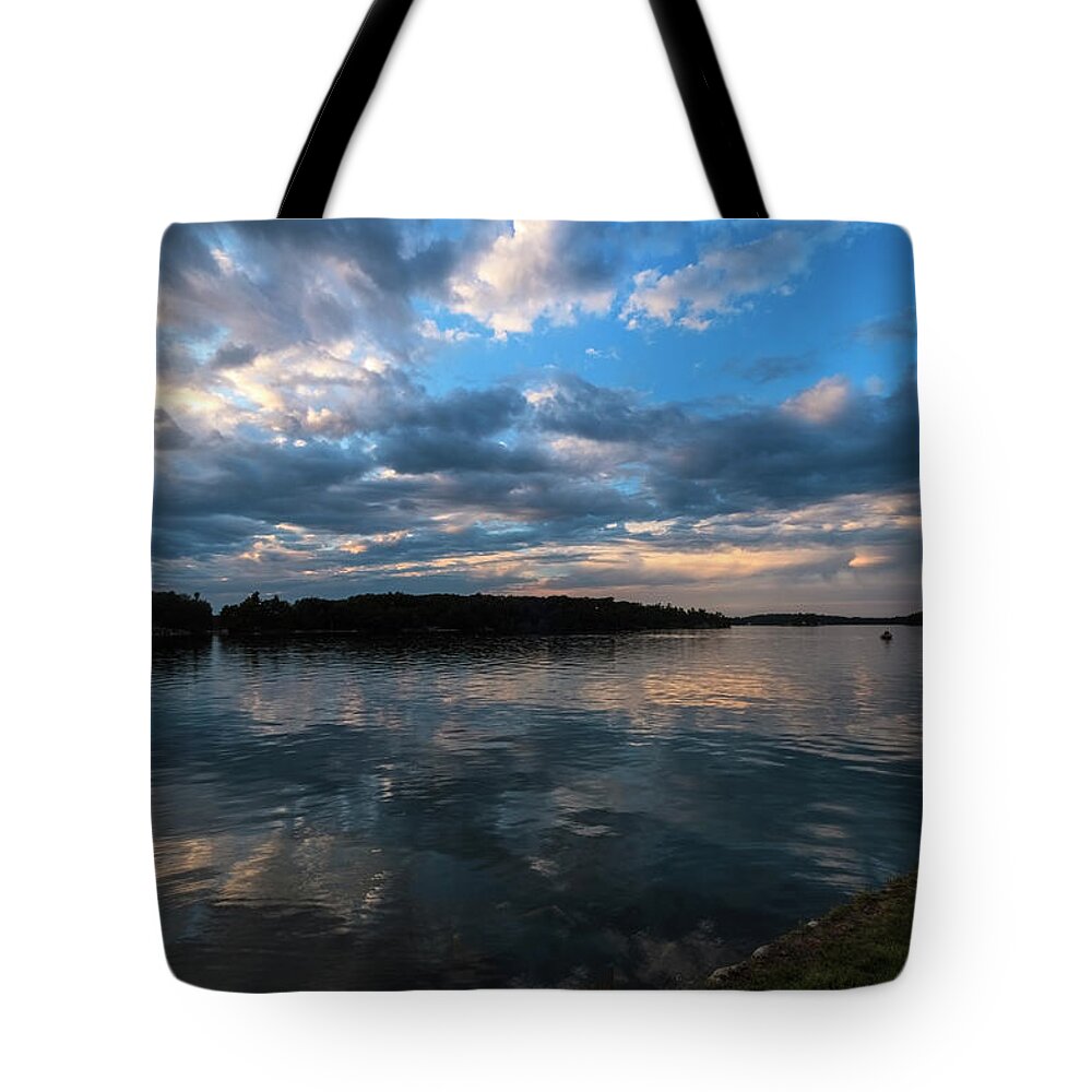 St Lawrence Seaway Tote Bag featuring the photograph Sunset On The River by Tom Singleton