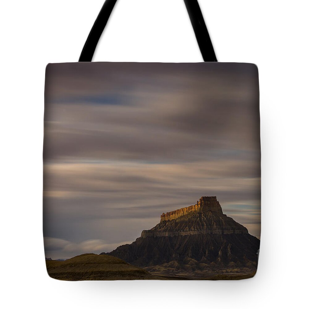 Factory Butte Tote Bag featuring the photograph Sunset over Factory Butte by Keith Kapple