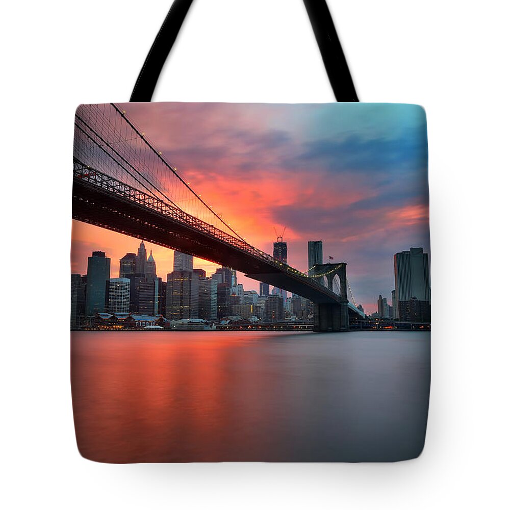 Sunset Tote Bag featuring the photograph Sunset over Manhattan by Larry Marshall