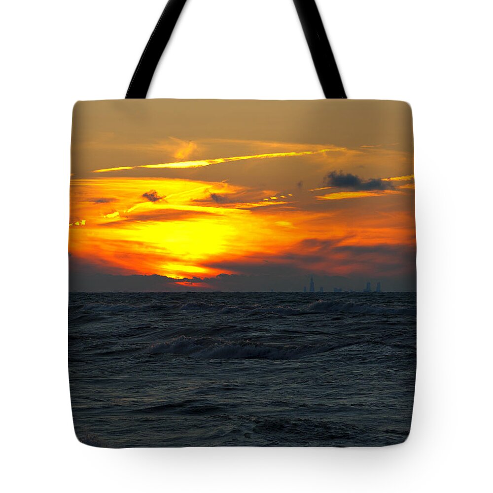 Sunset Tote Bag featuring the photograph Sunset over the city by Scott Wood