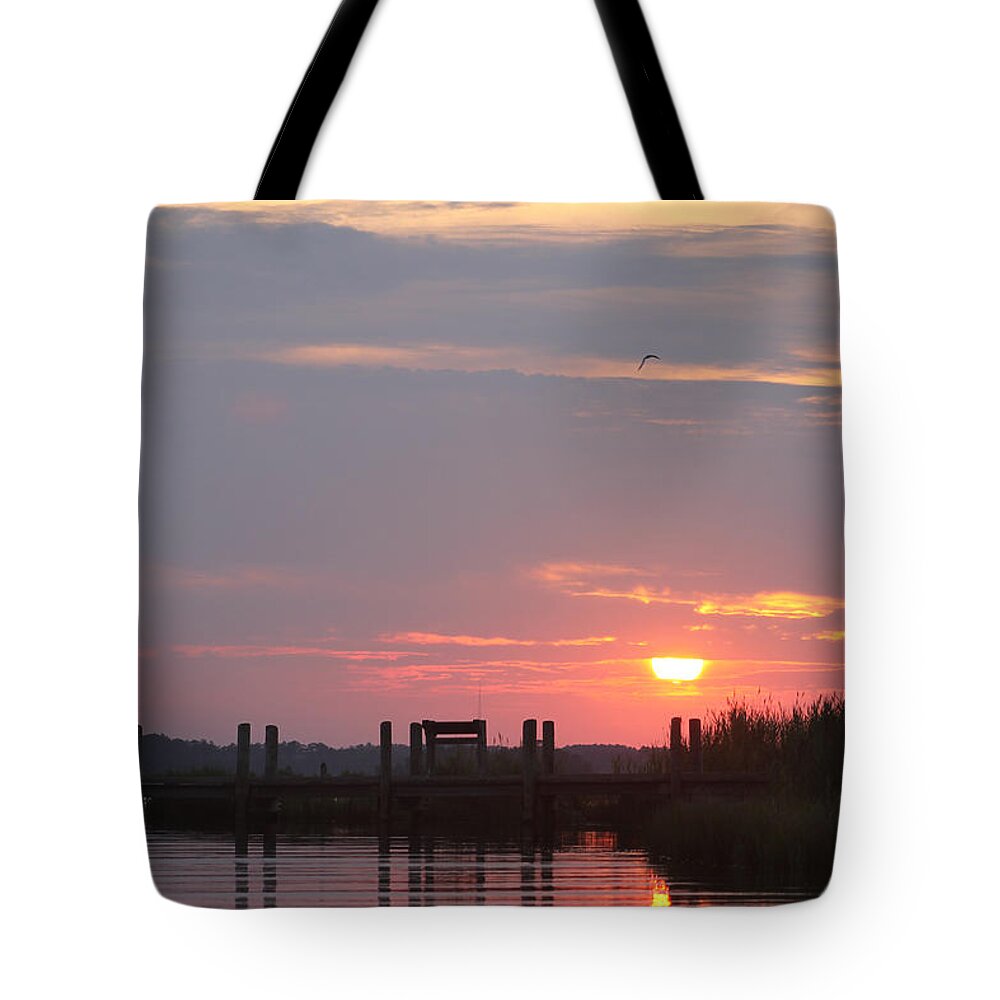 Water Tote Bag featuring the photograph Sunset Over The Wetlands by Robert Banach