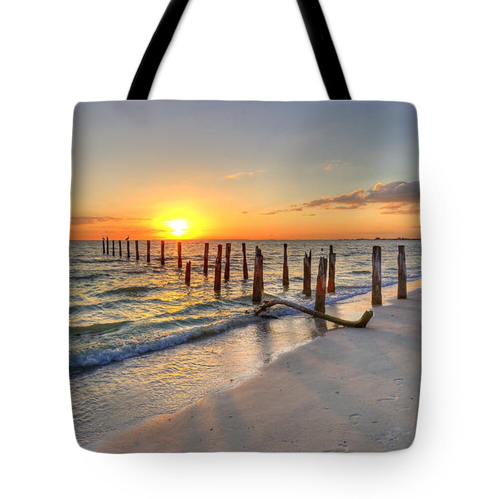 Southwest Tote Bag featuring the photograph Sunset Pilings by Sean Allen