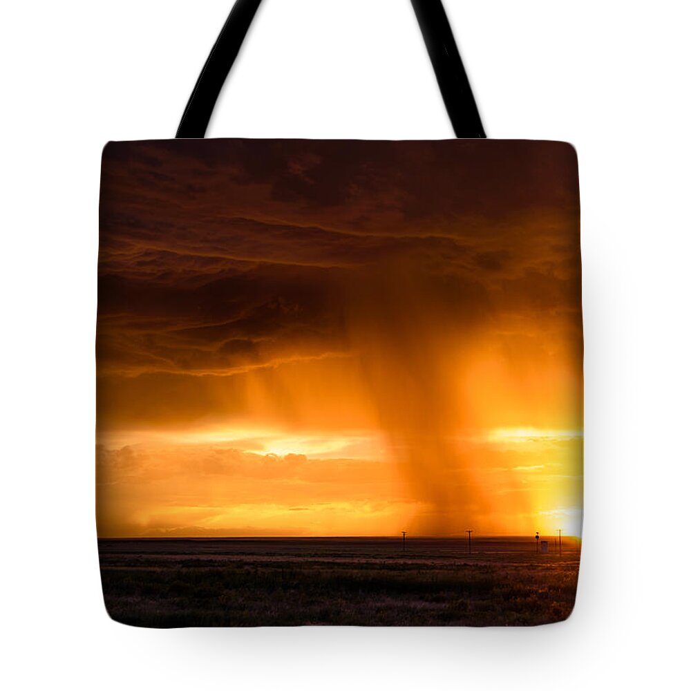 Sunset Tote Bag featuring the photograph Sunset Shower by Paul Moore