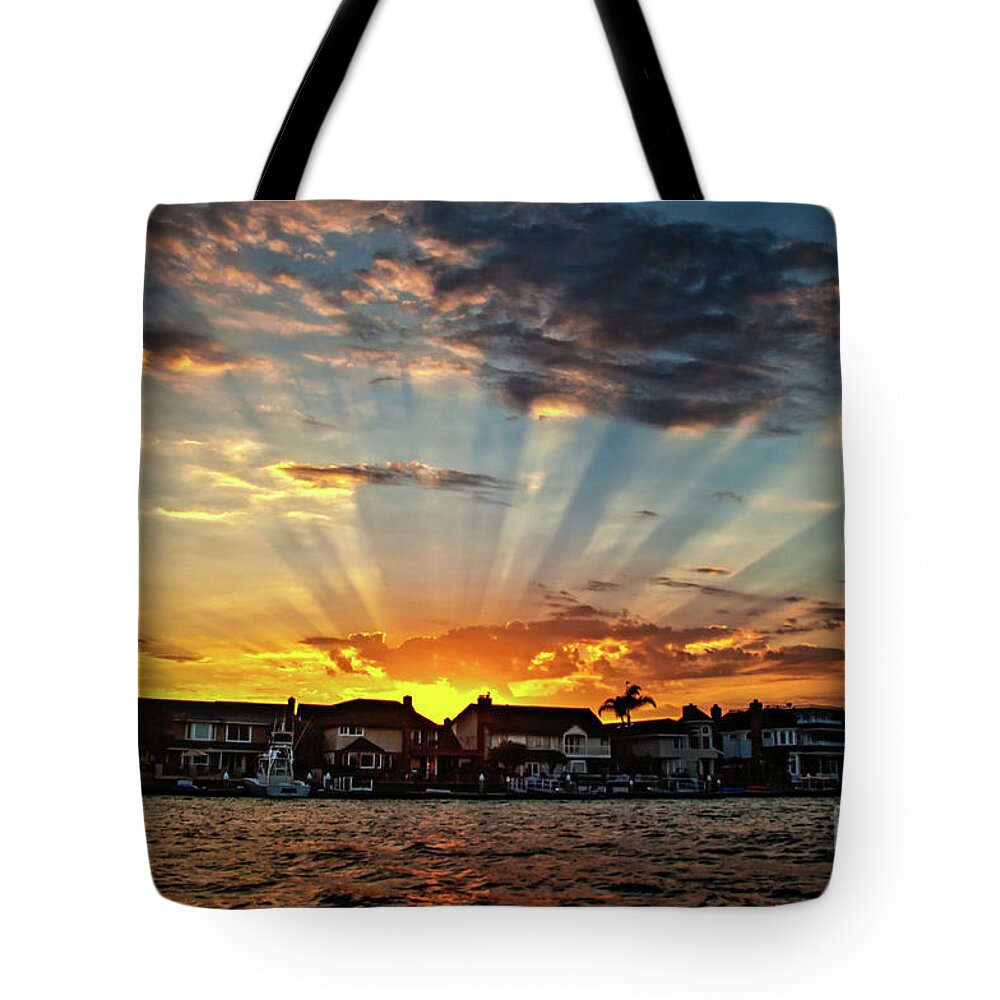 Sun Rays Tote Bag featuring the photograph Sunset Sunrays over Huntington Harbour by Peter Dang
