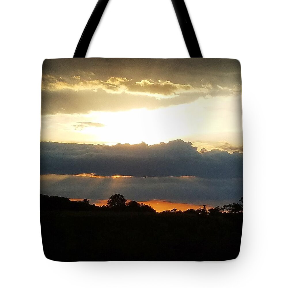 Sunset Tote Bag featuring the photograph Sunset Through the Dark by Vic Ritchey