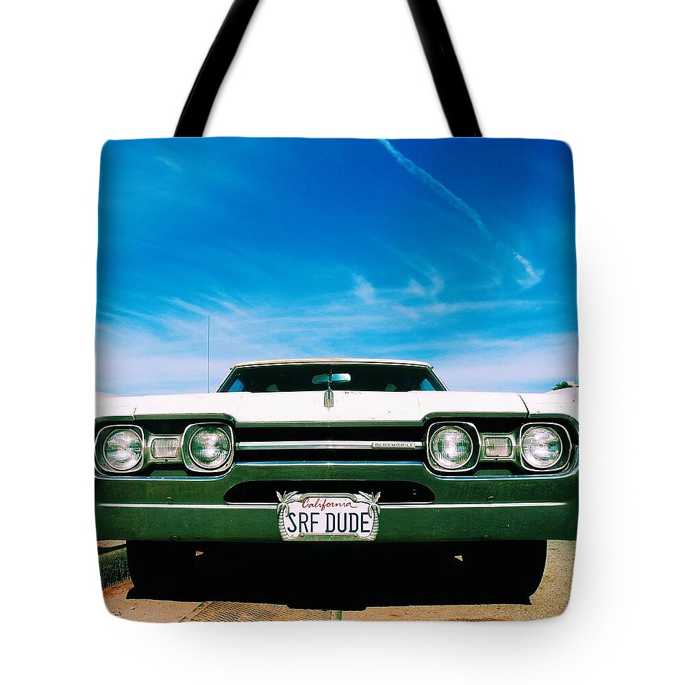 Surfdude Tote Bag featuring the photograph Surf Dude's Oldsmobile by Robert Ceccon