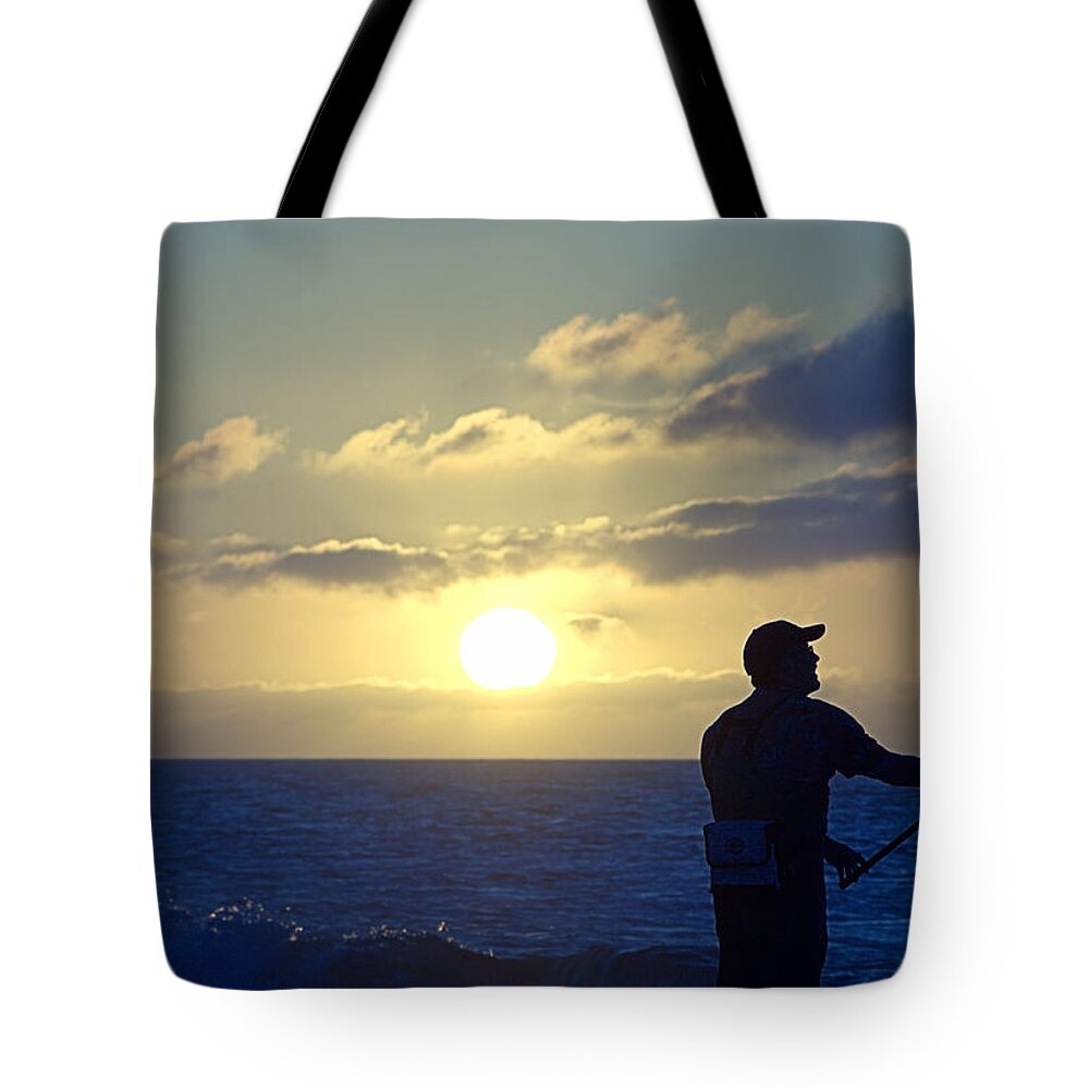 Surfcasting Tote Bag featuring the photograph Surfcasting by Newwwman