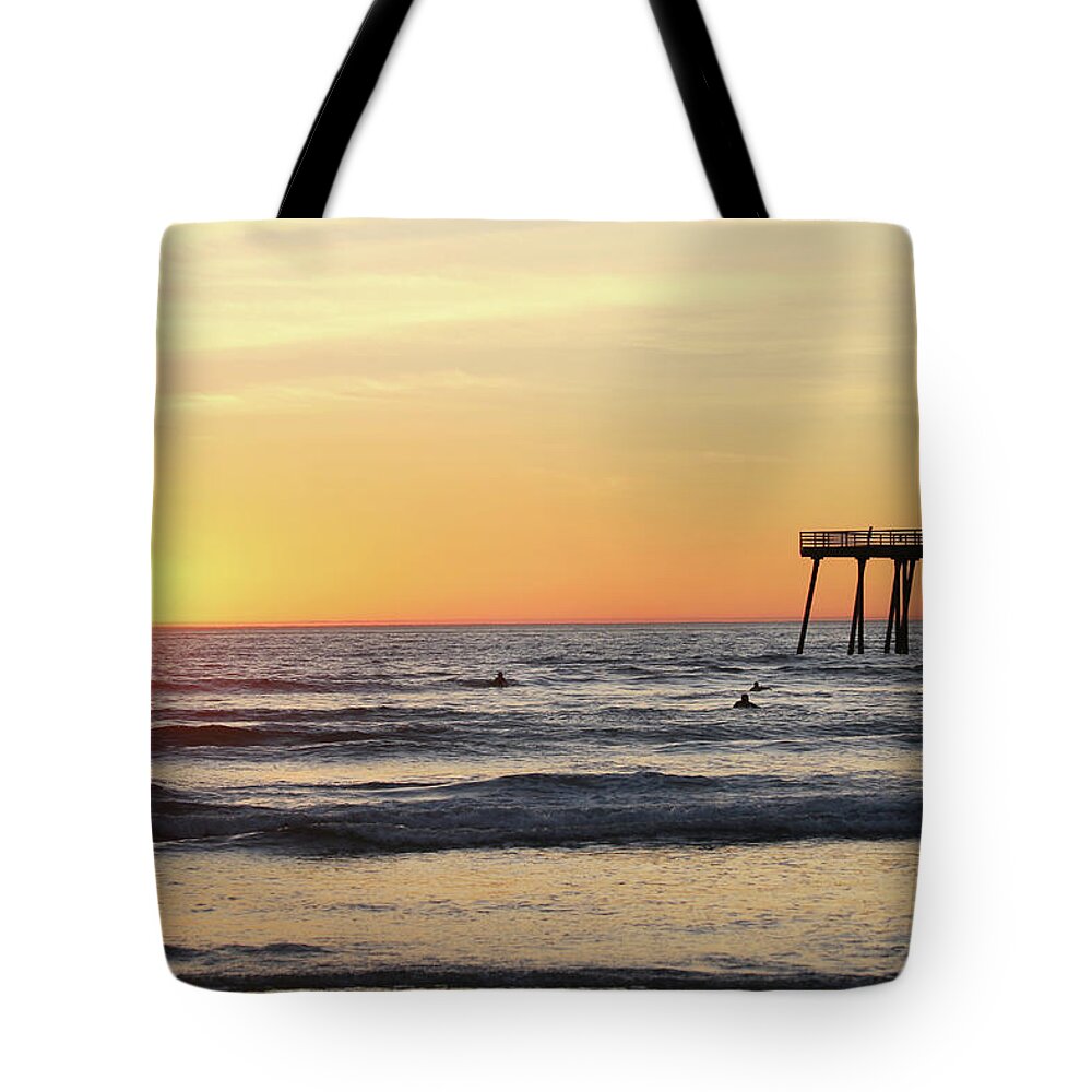 Pismo Beach Pier Tote Bag featuring the photograph Surfing in the Setting Sun by Art Block Collections