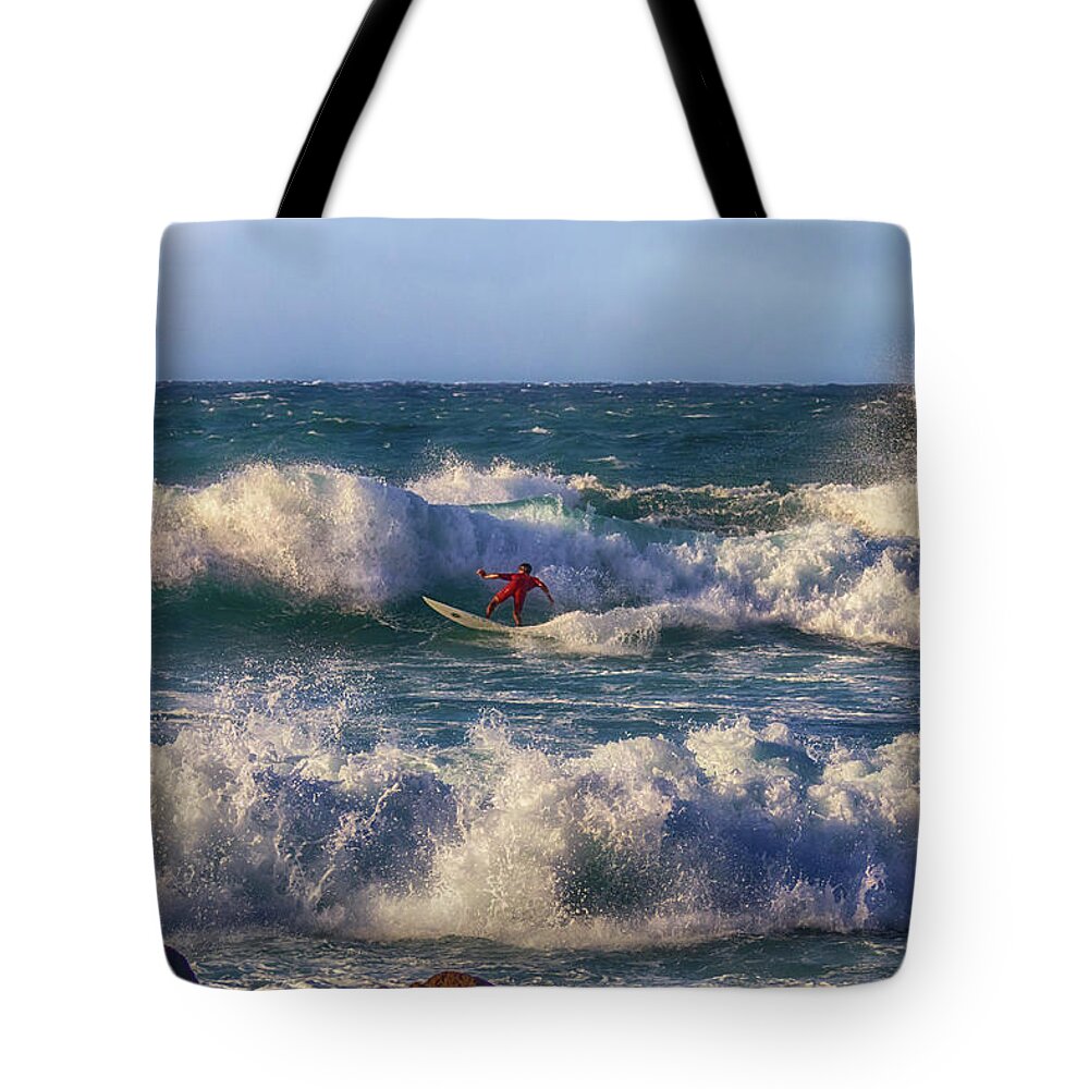 Surfing Tote Bag featuring the photograph Surfing the Angry Sea by Susan Rissi Tregoning
