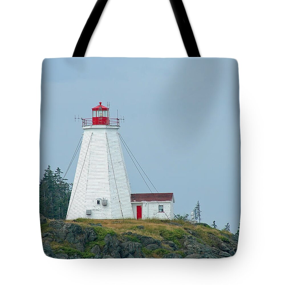 Lighthouse Tote Bag featuring the photograph Swallowtail Lighthouse by Thomas Marchessault