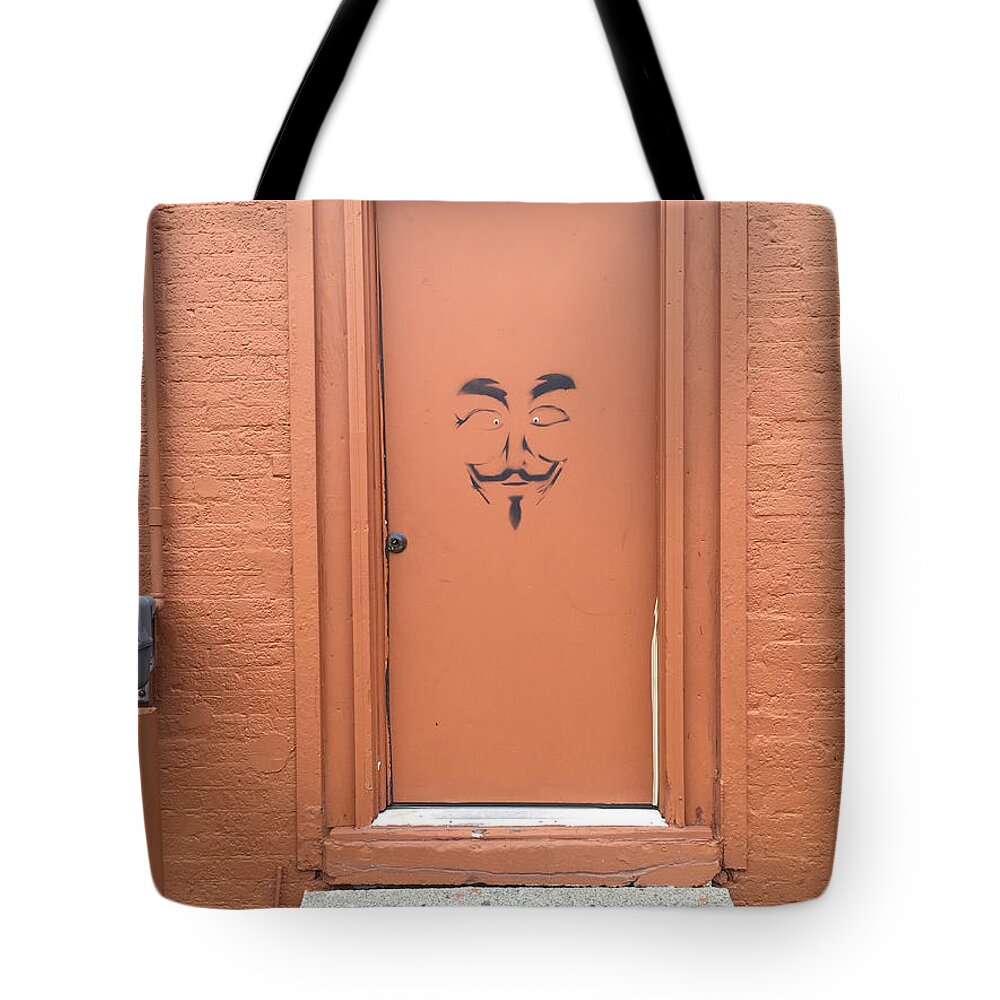 Graffiti Tote Bag featuring the photograph Swann Door by Joseph Yarbrough