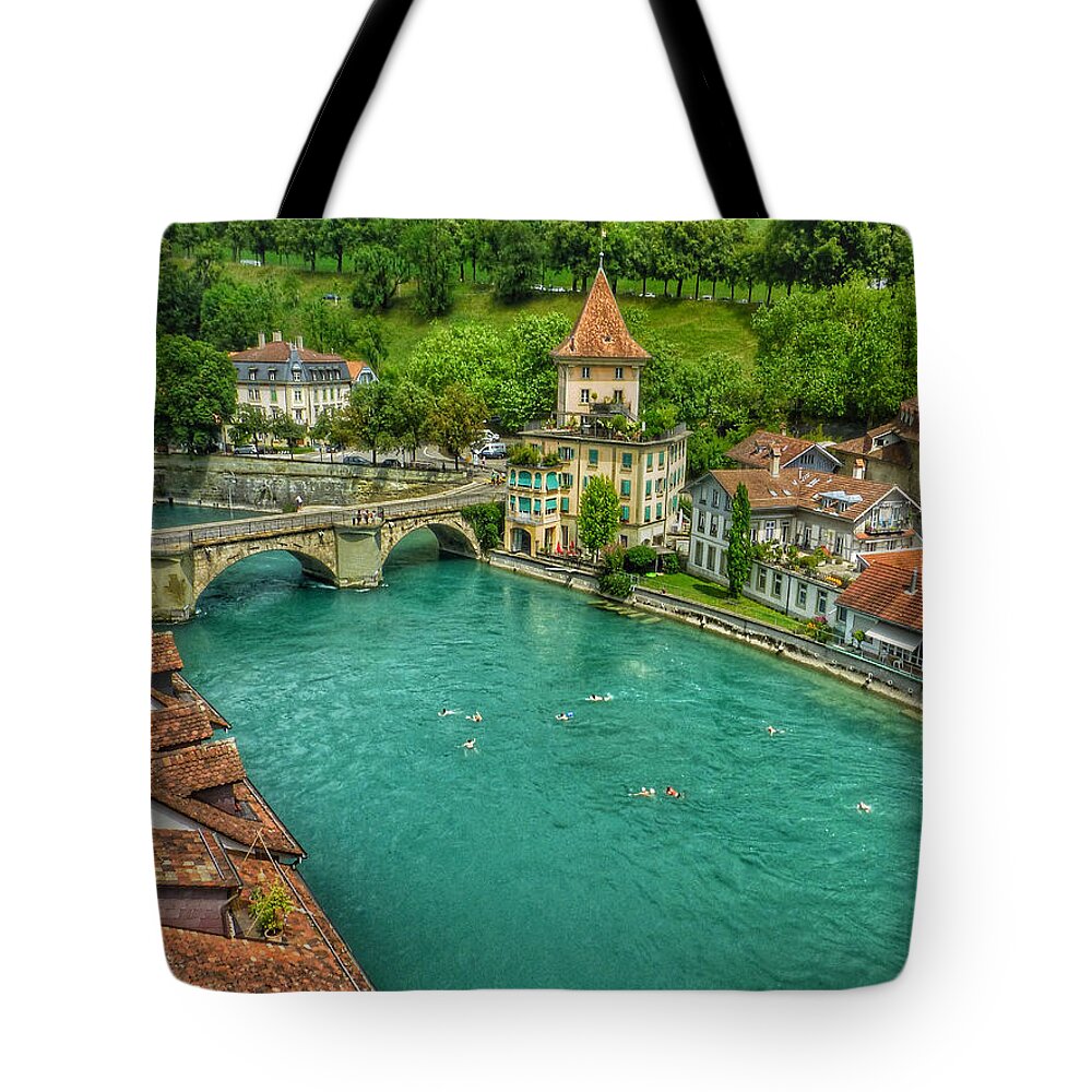 Connie Handscomb Tote Bag featuring the photograph Swimming The River Aare , Bern by Connie Handscomb
