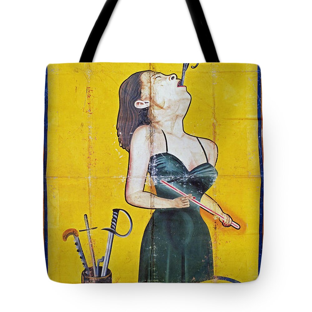 1950s Tote Bag featuring the photograph SWORD SWALLOWER, c1955 by Granger