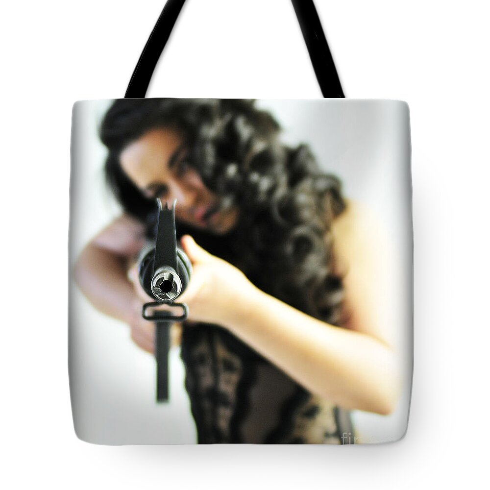 Glamour Photographs Tote Bag featuring the photograph Taking aim by Robert WK Clark