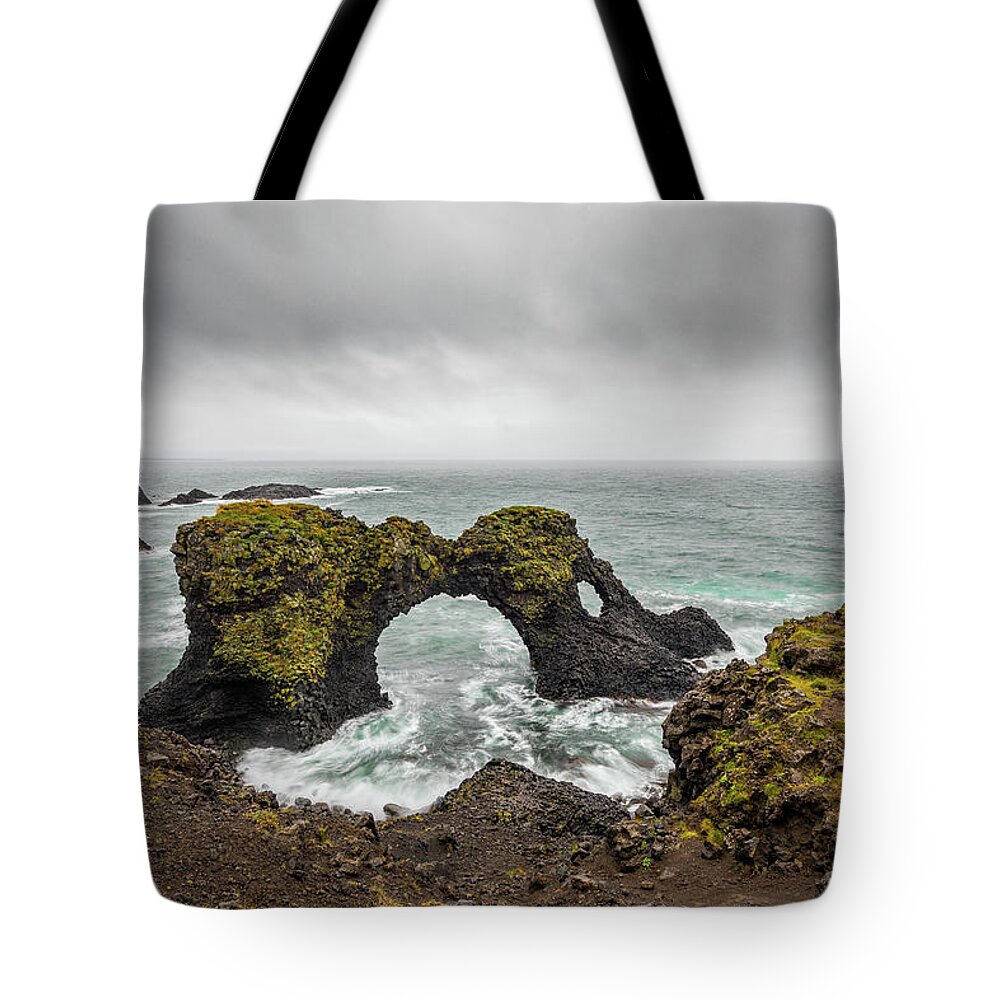 Iceland Tote Bag featuring the photograph The Arch at Gatklettur by Rikk Flohr