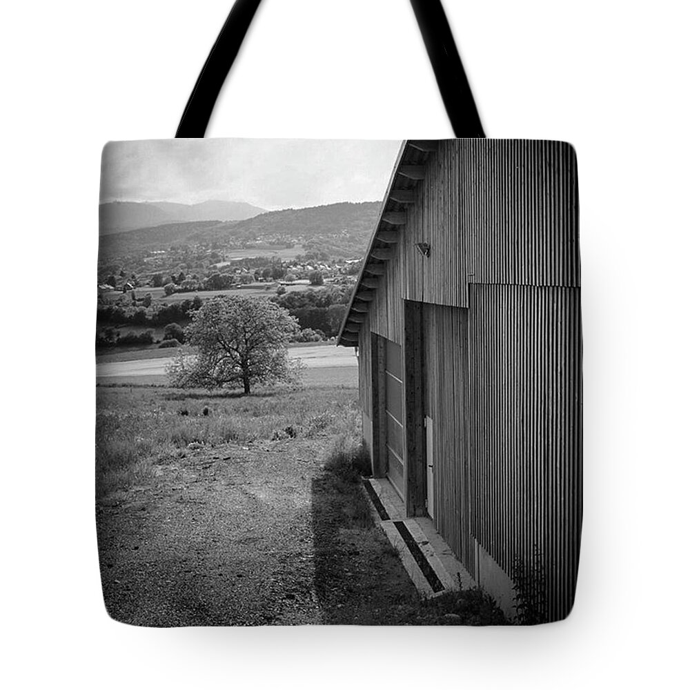 Europe Tote Bag featuring the photograph The Barn, Switzerland by Aleck Cartwright
