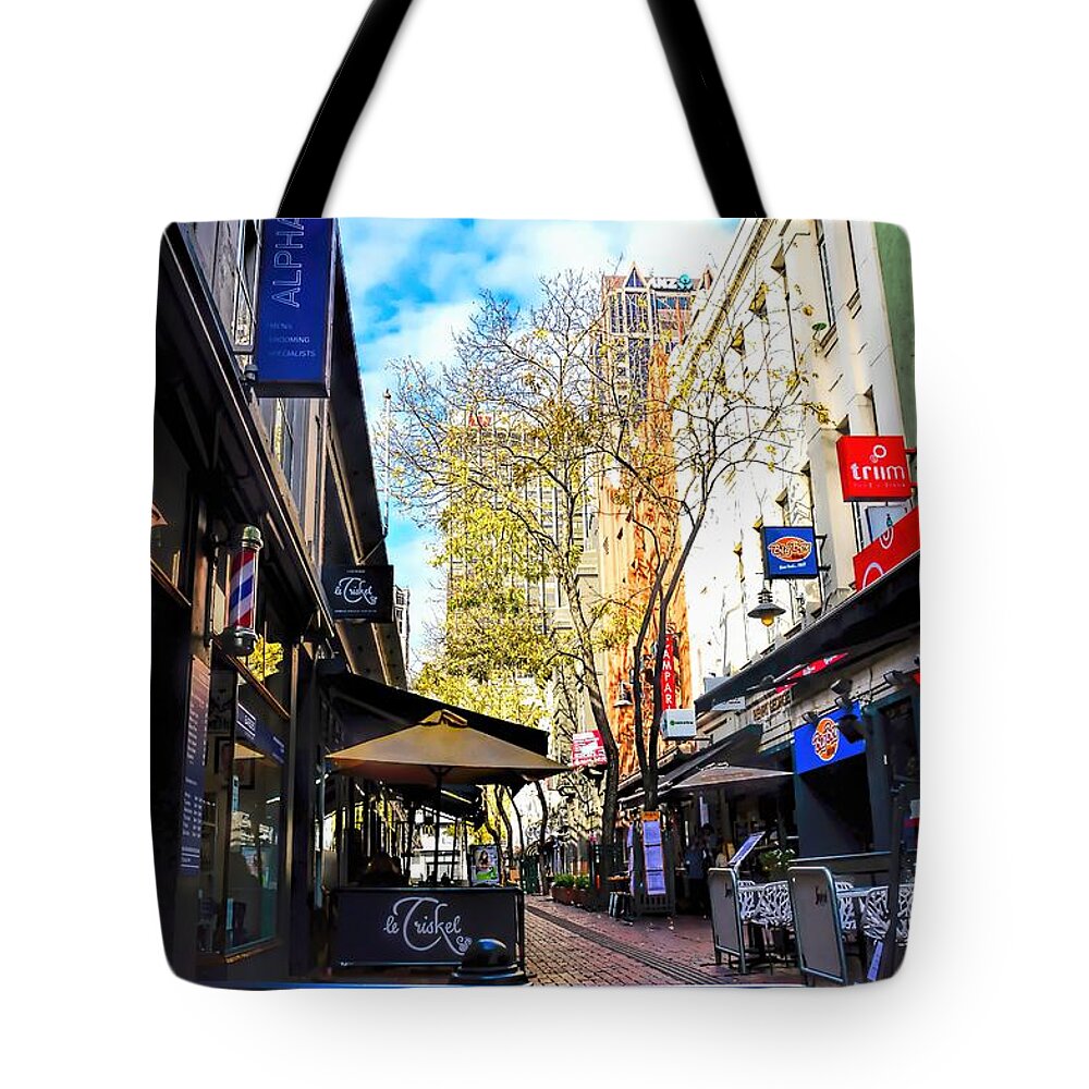 Cityscape Tote Bag featuring the photograph The Cafe by Diana Mary Sharpton