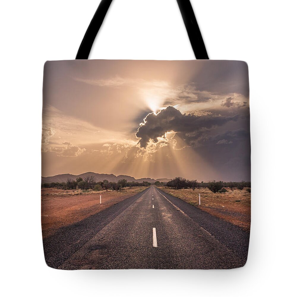 The Calm Before The Storm Tote Bag featuring the photograph The Calm Before The Storm by Racheal Christian