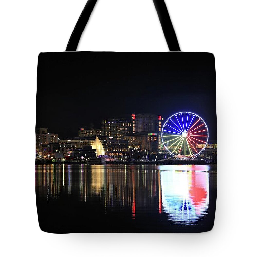 Photosbymch Tote Bag featuring the photograph The Capital Wheel over the Potomac by M C Hood