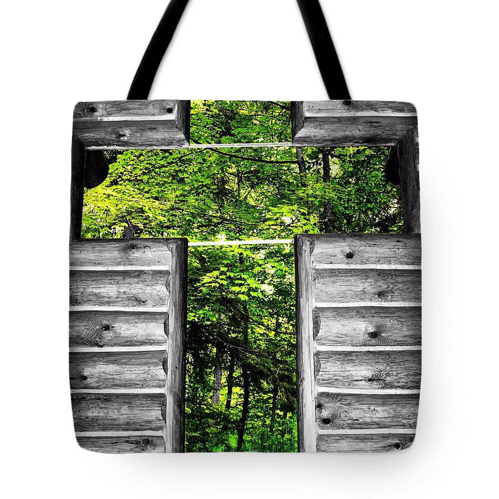  Tote Bag featuring the photograph The Carpenters cross by Daniel Thompson