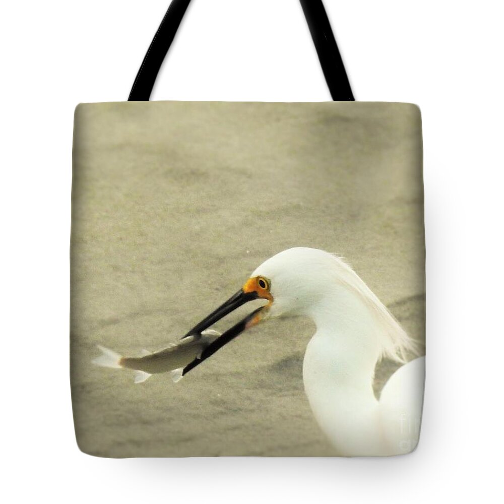 Wildlife Tote Bag featuring the photograph The Catch by Jan Gelders