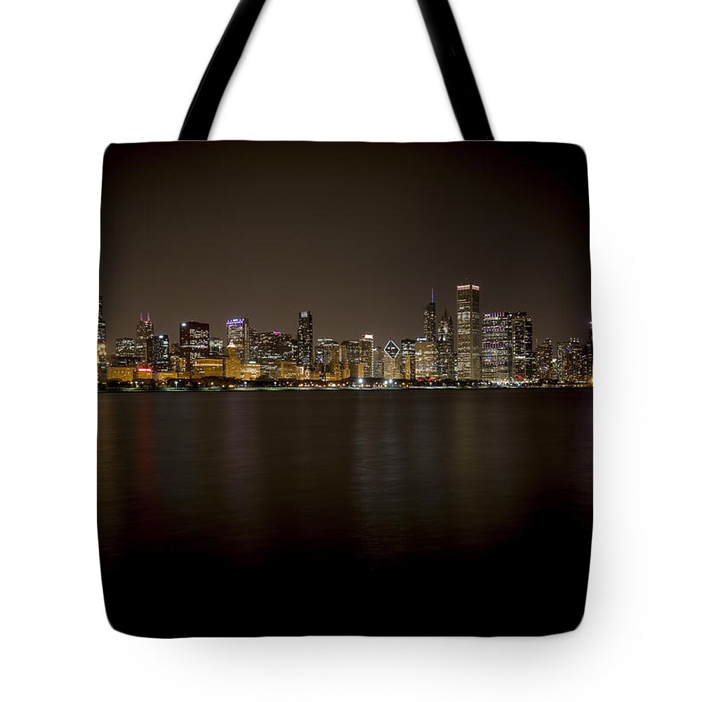 Chicago Tote Bag featuring the photograph The Chicago Skyline by The Flying Photographer