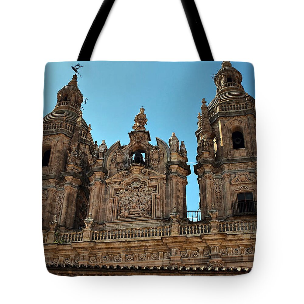 Clerecia Tote Bag featuring the photograph The Clerecia Church in Salamanca by Farol Tomson