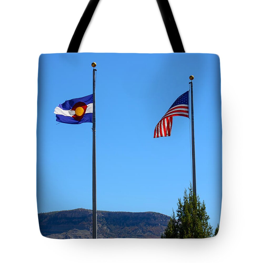Landscape Tote Bag featuring the photograph The Colorado State Flag with Old Glory by Tikvah's Hope