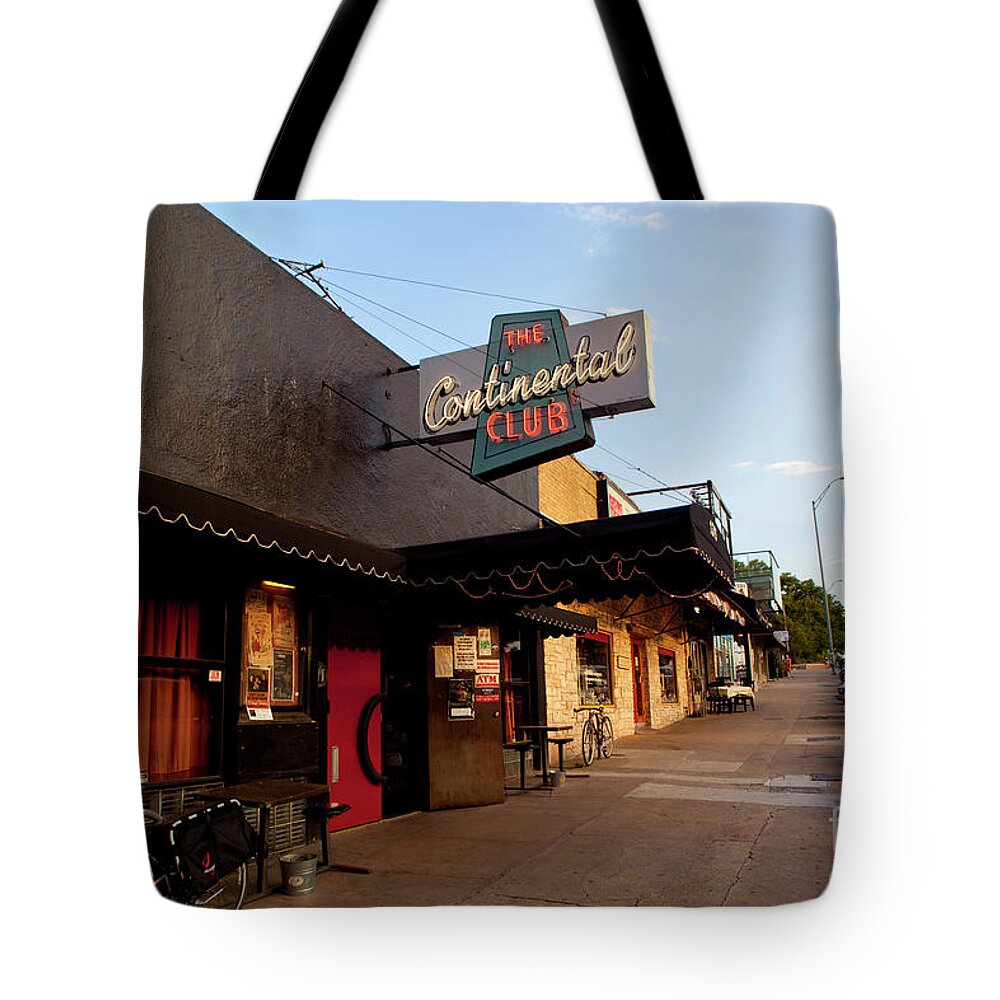 The Continental Club Tote Bag featuring the photograph The Continental Club is a local favorite front door and sidewalk lo by Dan Herron