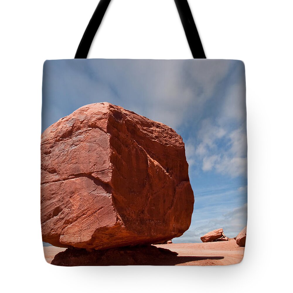 Arid Climate Tote Bag featuring the photograph The Cube at Monument Valley by Jeff Goulden