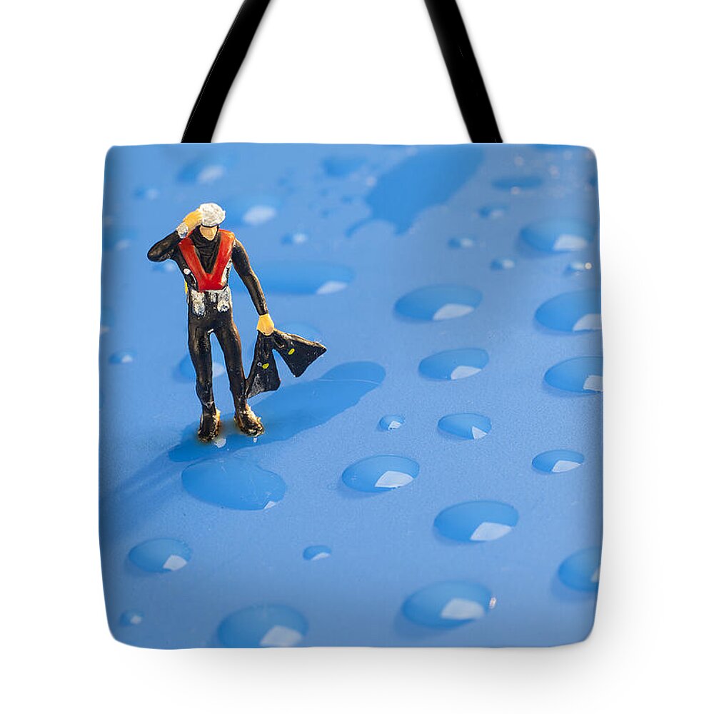Diver Tote Bag featuring the photograph The diver among water drops little people big world by Paul Ge