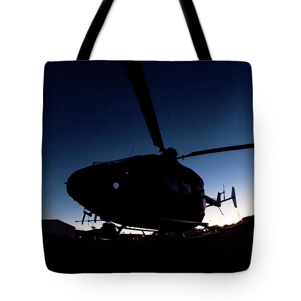 Bk117 Tote Bag featuring the photograph The Dot by Paul Job