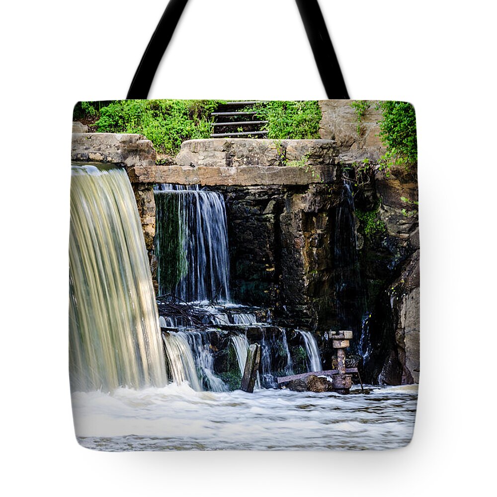 Crabtree Creek Tote Bag featuring the photograph The Edge of a Waterfall by Anthony Doudt