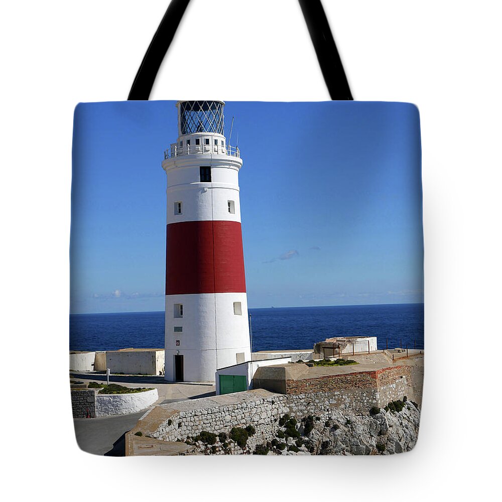 Lighthouse Tote Bag featuring the photograph The First and Last Lighthouse on the Continent of Europe by Brenda Kean