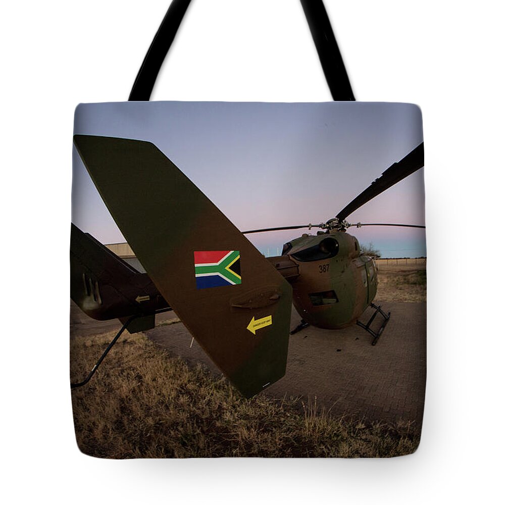 Blade Tote Bag featuring the photograph The Flag by Paul Job