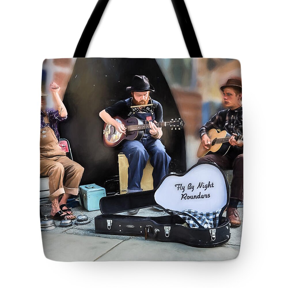 Buskers Tote Bag featuring the photograph The Fly By Night Rounders by John Haldane