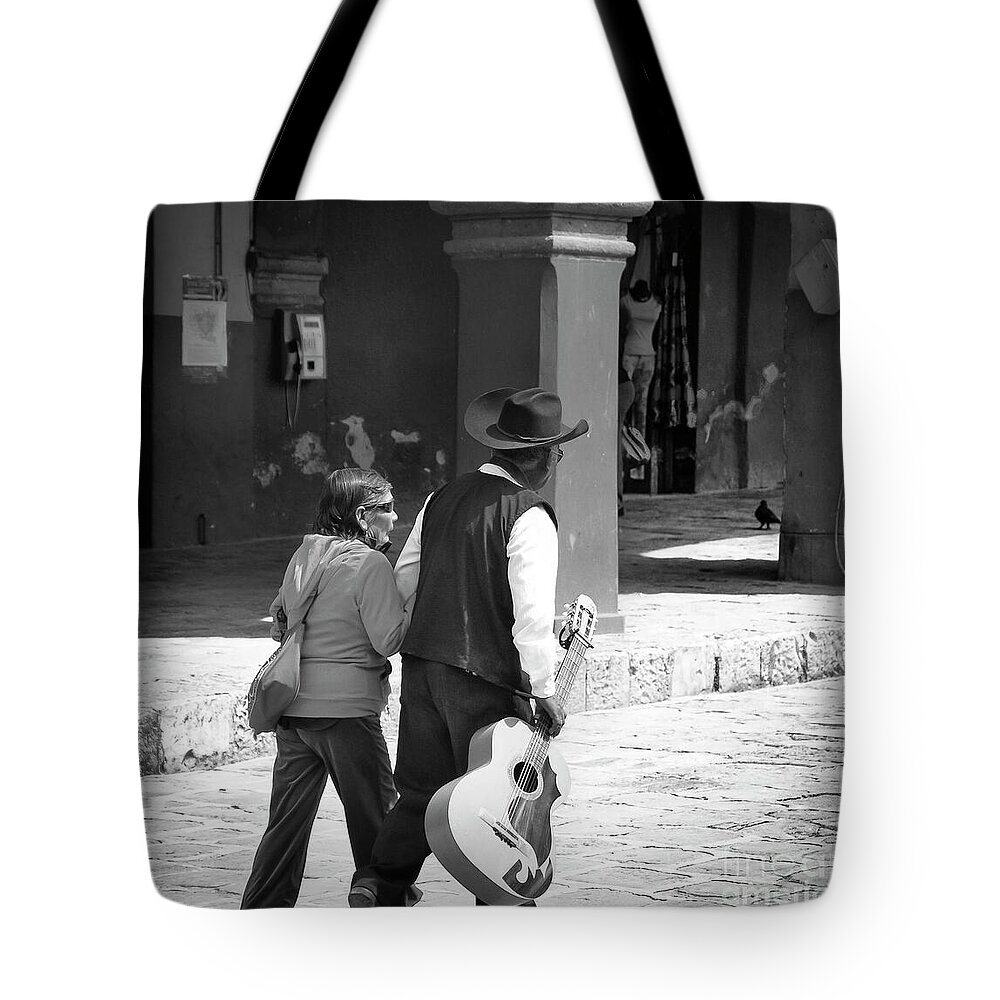 Guitar Player And Wife Tote Bag featuring the photograph The Gig Is Over by Barry Weiss