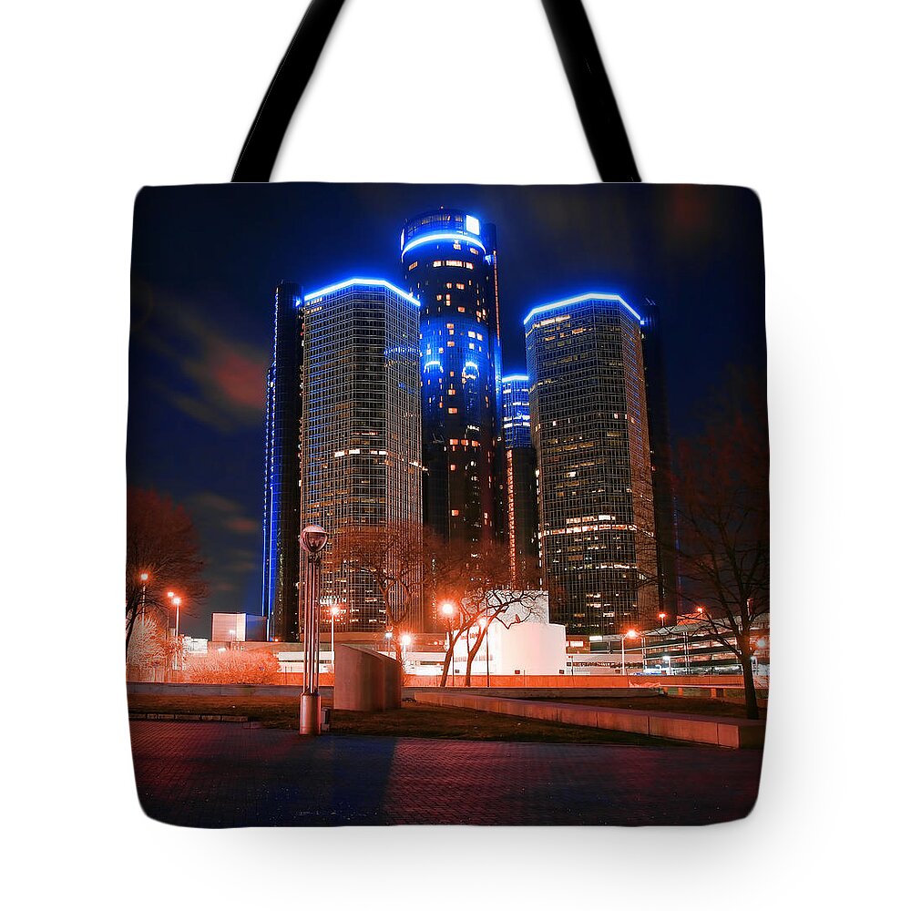 Detroit Tote Bag featuring the photograph The GM Renaissance Center At Night From Hart Plaza Detroit Michigan by Gordon Dean II