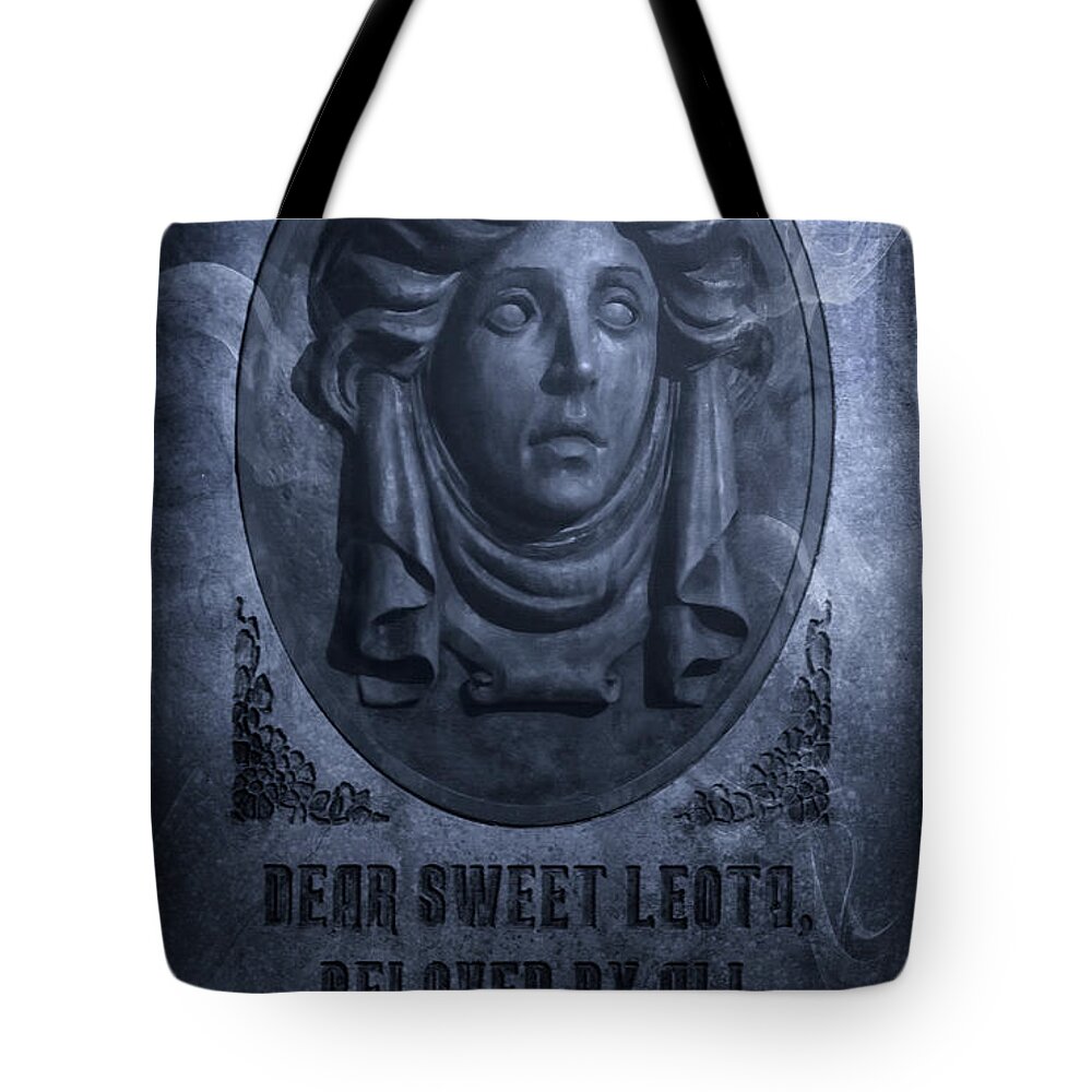 Magic Kingdom Tote Bag featuring the photograph The Headstone of Madame Leota by Mark Andrew Thomas