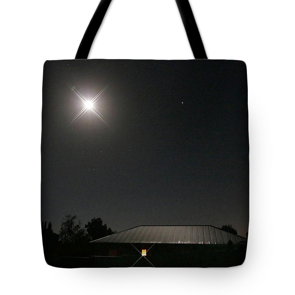 Light Tote Bag featuring the photograph The Light Has Come by Evelyn Tambour