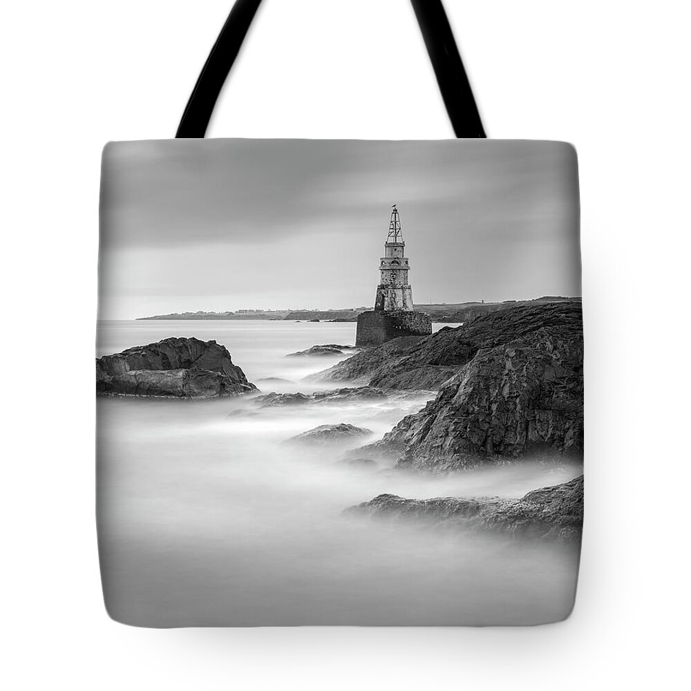 Sunrise Tote Bag featuring the photograph The lighthouse by Plamen Petkov